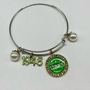 Links Green and Silver Charm Bracelet